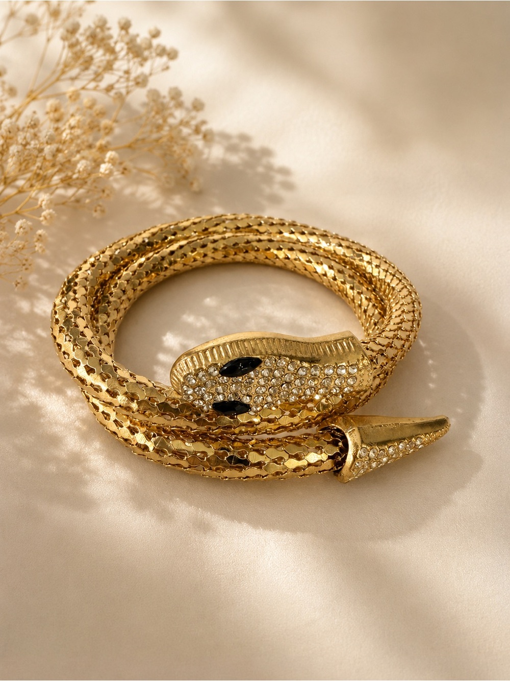 Gold Crystal Snake Wrap Bracelet with Black Stone Eyes